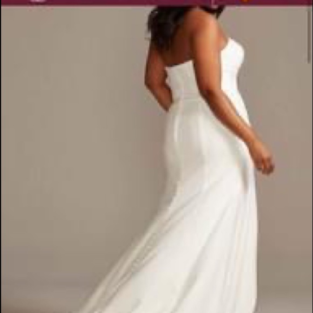 Strapless, floor-length wedding dress with train.